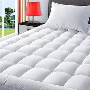 Get ready to sleep like royalty with the TEXARTIST Queen Mattress Pad Cover
